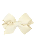 Scalloped Edge Faux Velvet Bow