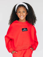 The Becca Boxy Crewneck Go Dawgs Woven Label