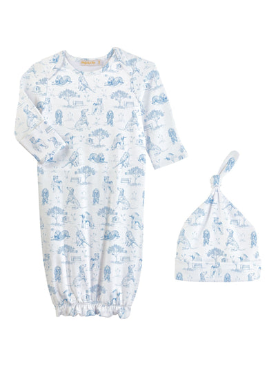 Baby gown and hat set with blue animal pattern on a white background