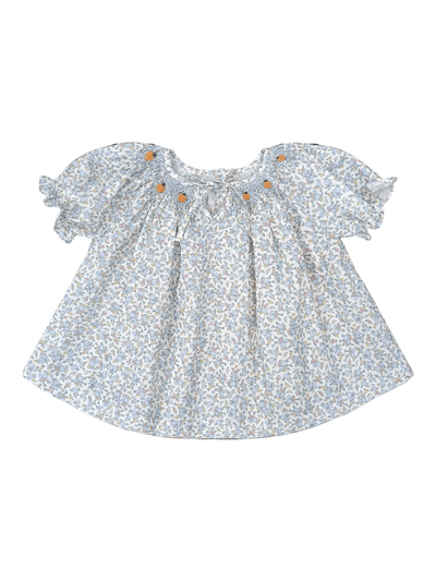 Floral blouse smocked pumpkins with ruffled sleeves on a white background
