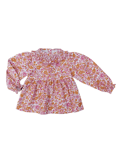 Floral patterned blouse on a white background